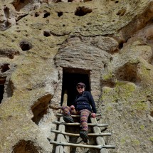 Marion in front of a cave house in the Frijoles Canyon in the Bandelier Natonal Monument